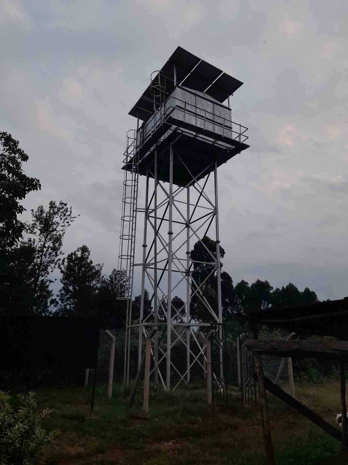 Elevated solar-powered water tank tower installed by GRANFI